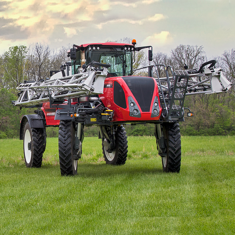 HS1100 Apache Sprayer sitting in grass field