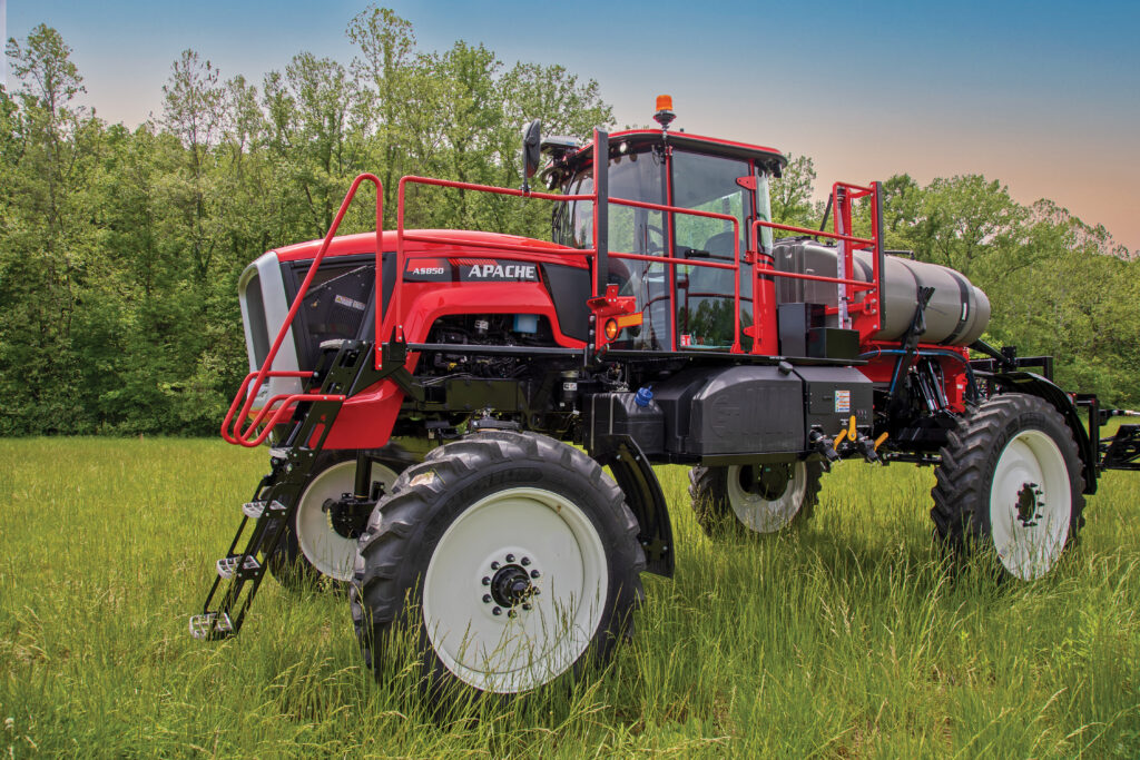 AS850 Apache Sprayer sitting in grass field