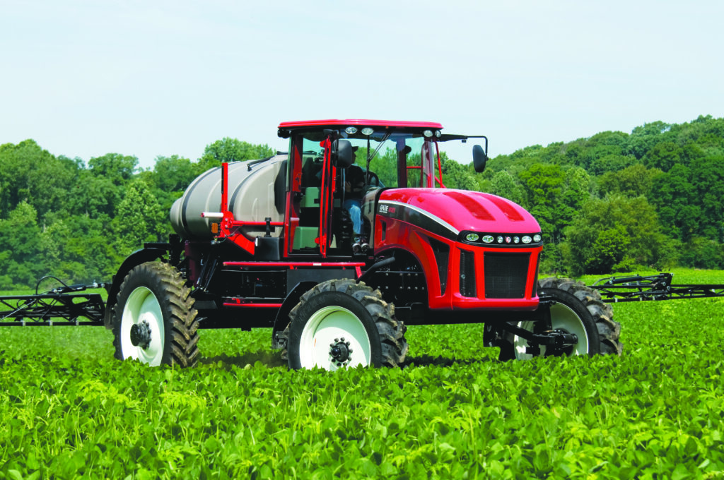 used apache sprayer being used in bean field